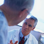 Image of a man conversing with his doctor